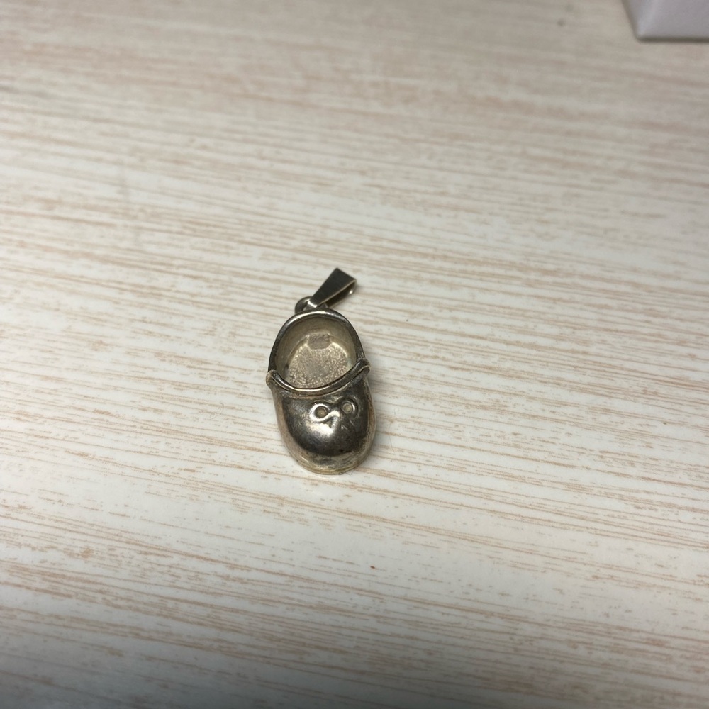 Vintage sterling silver baby shoe charm